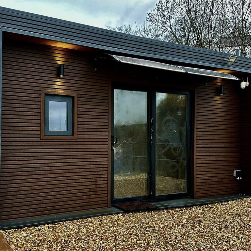 Grantlife project summer house with wood cladding